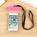 Waterproof phone pouch with pink clip and black lanyard for beach and swimming use - Pink