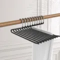 Black multi-layer pants hanger, space-saving closet organizer for trousers and skirts. - Black