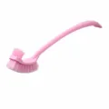 Pink toilet brush with long curved handle and double-sided bristles for deep cleaning bathroom. - Candy Pink