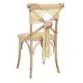 Rustic wedding chair decoration with sheer chiffon sash and artificial flower bow. - Camel