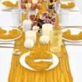 Yellow cheesecloth table runner and matching napkins set for wedding party table decor. - Turmeric