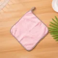 Detailed close-up of a pink checkered hanging coral fleece kitchen hand towel, soft texture. - Light Pink