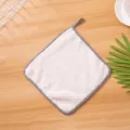 Hanging coral fleece hand towel kitchen absorbent dishcloth with plaid border detail view. - White