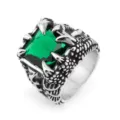 Detailed close-up of a vintage gothic dragon claw ring featuring a square green synthetic stone. - Size 7 / Green