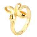 Gold titanium steel ring with unique cross ribbon design, stylish minimalist fashion jewelry. - Size 7 / Gold