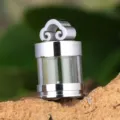 Detailed shot of titanium steel hollow glass pendant, featuring ruyi cloud top and metal frame. - Single Pendant (Steel Color)