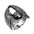 Close-up detail of vintage punk skull wing ring in titanium steel, gothic biker style. - Size 7 / Silver