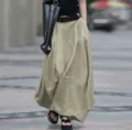 Detailed view of women high waist loose khaki maxi skirt, casual long A-line drape design. - Apricot