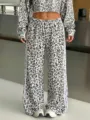 Leopard print wide leg sweatpants with contrast side stripes and matching crop top detail. - S / Bottoms / White