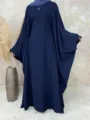 Detail view of the casual solid navy blue batwing sleeve maxi dress and matching hijab. - S / Dresses / Navy Blue