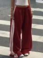 Women casual loose red track pants with white side stripes, perfect for autumn street style. - S / Bottoms / Burgundy