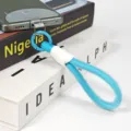 Detailed view of blue woven phone lanyard wrist strap with metal ring and clear tether tab. - Lanyard and Patch 13