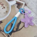 Colorful woven phone lanyard with cute purple star pendant, simple keychain strap for daily use. - Star Style 1
