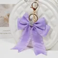 Purple satin bow keychain with rhinestone charm, chic handbag accessory and chic pendant. - Style 4