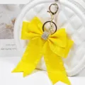 Yellow fabric bow keychain with sparkling rhinestones, perfect cute bag charm and accessory. - Style 7