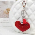Llavero de corazón de diamantes de imitación rojos con borla, colgante lindo para bolsos. - Rojo