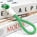 Green braided phone lanyard keychain with white wrap detail and a practical metal hook accessory. - Single Rope 2