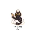 Detailed close-up of Halloween cartoon black cat skull enamel alloy pendant accessory. - 8# Pistol Cat
