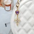 Alloy rhinestone cross bag charm keychain, purple heart crystal, gold finish accessory. - Style 8