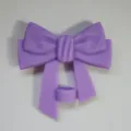 Close up of cute purple silicone bow straw cap, perfect dust-proof cover for 10mm tumblers. - Purple
