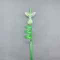 Green spiral drinking straw with a clear glitter mermaid tail topper for party and home use. - Green