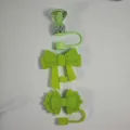 Food-grade silicone straw covers with cute bow and diamond designs, perfect tumbler dust plugs. - Green