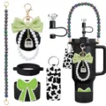 Detail view of tumbler accessories set including beaded strap, bow keychain, and leopard pouch. - Picture 15