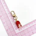 Halloween metal gravestone keychain red skeleton hand charm cute unisex bag pendant. - Tombstone (Gold Hook) / Red
