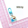 Metal enamel keychain with sailboat and lucky blessing text pendant, lightweight design SKU display - Smooth Sailing