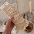 Cozy knitted leg warmers with delicate lace trim, stylish winter Y2K accessories for women. - One Size / Rice Apricot