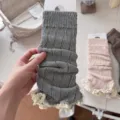 Knit leg warmers with delicate lace trim, stylish winter y2k fashion boot cuffs for women. - One Size / Gray