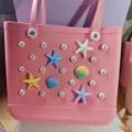 Pink EVA beach bag detail with pearl and starfish charms, perfect for summer vacation. - 23 Pieces Set (Sealed Bag)
