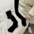 Classic black over-the-knee long socks for women, cozy winter knit thigh high socks. - One Size / Black