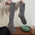Grey knitted cable calf socks, thick cozy winter hosiery for women, vintage minimalist style. - Mid-Calf Gray