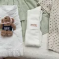 Korean style solid color over-the-knee socks with paper band packaging, soft ribbed long tube design. - One Size / White