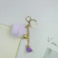 Lila Pompom Quasten Schlüsselanhänger mit goldener Glocke Plüsch Tasche Anhänger Deko - Lila