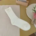 Solid color thick warm mid-calf knit socks for women, cozy winter daily casual wear. - One Size / White