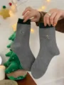 Grey Christmas mid-calf socks with dark green cuff and cute embroidered tree pattern. - Medium Grey