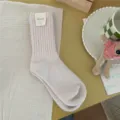 Solid color warm rabbit hair mid-tube socks for women winter casual thick knit hosiery. - One Size / Light Pink