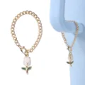 Gold chain tulip cup charm with white enamel flower pendant, stylish aesthetic accessory. - White
