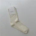 Chaussettes mi-hautes en coton blanc unie, style japonais simple, tricot doux quotidien. - Taille unique / Crème