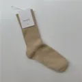 Chaussettes unies côtelées en beige avec étiquette de marque, style quotidien. - Taille unique / Kaki