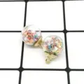 DIY glass ball pendant with colorful star sequins and gold alloy loop for jewelry making. - Colorful