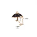 Close up detail of cute black and white cat holding umbrella metal charm pendant for DIY jewelry. - #8 Black Umbrella