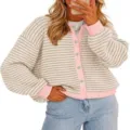 Detailed view of women's striped knit cardigan featuring pink contrast trim and stylish front buttons. - Apricot