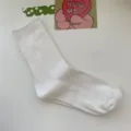 Chaussettes unies blanches en coton côtelé, style décontracté classique pour tous les jours. - Taille unique / Blanc cassé
