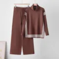 Detailed view of brown knit sweater and wide leg pants set with white stripe details. - One Size / Top And Bottom / Coffee