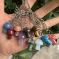 Close-up of various natural stone mushroom keychains with colorful crystal pendants - Mushroom (0003) / 10 Pieces/Pack / Multicolor