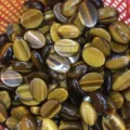 Detailed view of natural tiger eye oval cabochon stones for DIY jewelry design - 4*6mm / Tiger Eye