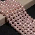 Détail de perles de nacre roses rondes et brillantes pour création de bijoux DIY - 62 Pièces/Mèche (16mm) / Rose